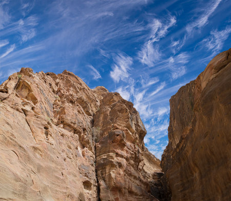 Mountains of Petra (against the background of a beautiful sky with clouds), Jordan, Middle East. Petra has been a UNESCO World Heritage Site since 1985の写真素材