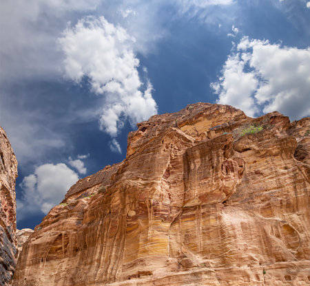 Mountains of Petra (against the background of a beautiful sky with clouds), Jordan, Middle East. Petra has been a UNESCO World Heritage Site since 1985の写真素材