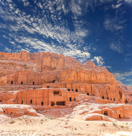 Mountains of Petra (against the background of a beautiful sky with clouds), Jordan, Middle East. Petra has been a UNESCO World Heritage Site since 1985の写真素材