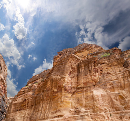 Mountains of Petra (against the background of a beautiful sky with clouds), Jordan, Middle East. Petra has been a UNESCO World Heritage Site since 1985の写真素材