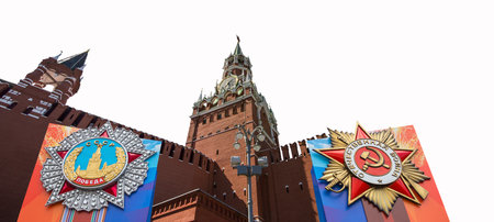Moscow Kremlin (with orders of victory)--Victory Day celebration (WWII), Russia-- the most popular view. Carved on white background. English translation from Russian: USSR, Victory, Patriotic warの写真素材
