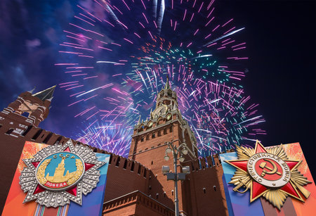 Moscow Kremlin (with orders of victory) and fireworks in honor of Victory Day celebration (WWII), Russia-- the most popular view. English translation from Russian: USSR, Victory, Patriotic warの写真素材