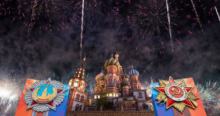 Cathedral of Intercession of Most Holy Theotokos on the Moat (Temple of Basil the Blessed) with orders of victory, and fireworks in honor of Victory Day celebration (WWII), Red Square, Moscow, Russiaの写真素材