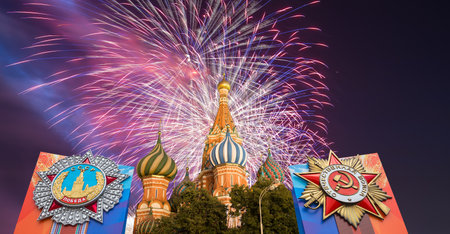 Cathedral of Intercession of Most Holy Theotokos on the Moat (Temple of Basil the Blessed) with fireworks in honor of Victory Day celebration, Red Square, Moscow, Russiaの写真素材