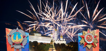 Moscow Kremlin (with orders of victory) and fireworks in honor of Victory Day celebration (WWII), Russia-- the most popular view. English translation from Russian: USSR, Victory, Patriotic warの写真素材