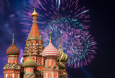 Temple of Basil the Blessed and fireworks in honor of Victory Day celebration (WWII), Red Square, Moscow, Russia.の写真素材