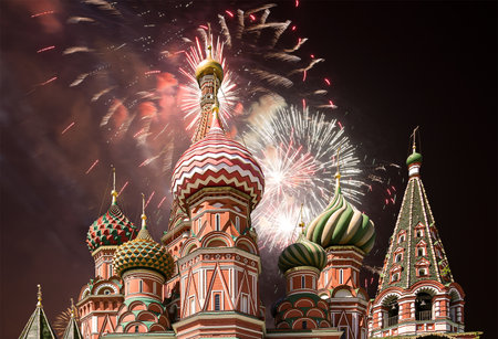 Temple of Basil the Blessed and fireworks in honor of Victory Day celebration (WWII), Red Square, Moscow, Russia.の写真素材