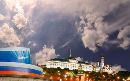 Moscow Kremlin (with decorations for the holiday of May 9 in honor of Victory Day celebration (WWII). Against the sky with clouds, Russia. TRANSLATION: Victory!の写真素材