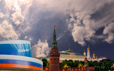 Moscow Kremlin (with decorations for the holiday of May 9 in honor of Victory Day celebration (WWII). Against the sky with clouds, Russia. TRANSLATION: Victory!の写真素材