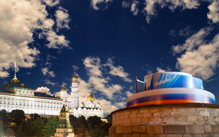 Moscow Kremlin (with decorations for the holiday of May 9 in honor of Victory Day celebration (WWII). Against the sky with clouds, Russia. TRANSLATION: Victory!の写真素材