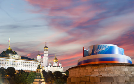 Moscow Kremlin (with decorations for the holiday of May 9 in honor of Victory Day celebration (WWII). Against the sky with clouds, Russia. TRANSLATION: Victory!の写真素材