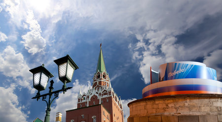 Moscow Kremlin (with decorations for the holiday of May 9 in honor of Victory Day celebration (WWII). Against the sky with clouds, Russia. TRANSLATION: Victory!の写真素材