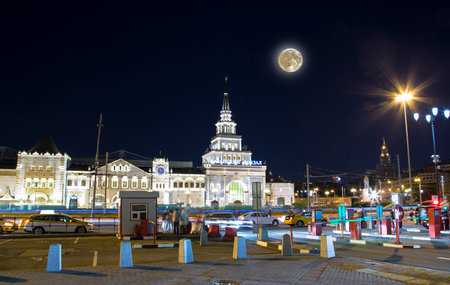 Kazansky railway terminal ( Kazansky vokzal written in Russian) with the moon -- is one of nine railway terminals in Moscow, Russiaの写真素材