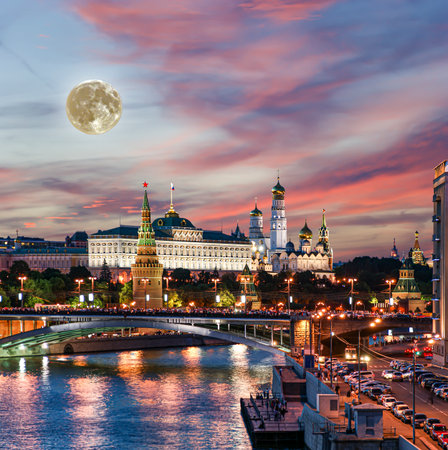 Night view of the Moskva River and Kremlin, Russia, Moscow (most popular view). Against the background of a beautiful sky with clouds, with the moonの写真素材