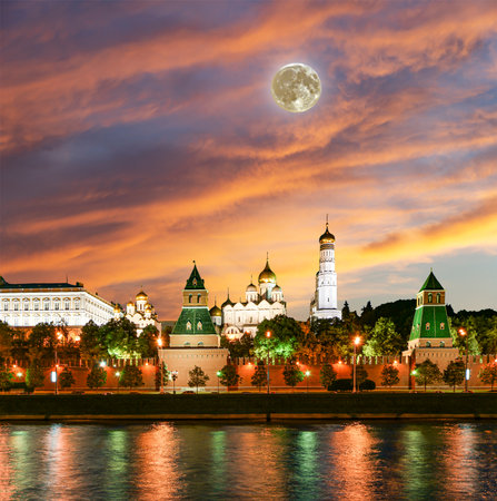 Night view of the Moskva River and Kremlin, Russia, Moscow (most popular view). Against the background of a beautiful sky with clouds, with the moonの写真素材