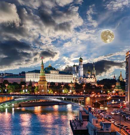 Night view of the Moskva River and Kremlin, Russia, Moscow (most popular view). Against the background of a beautiful sky with clouds, with the moonの写真素材