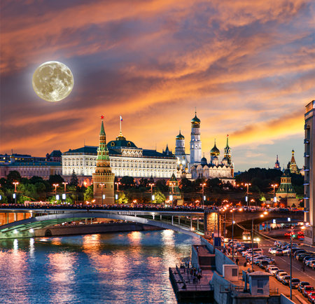 Night view of the Moskva River and Kremlin, Russia, Moscow (most popular view). Against the background of a beautiful sky with clouds, with the moonの写真素材