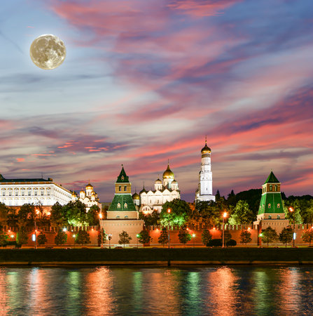 Night view of the Moskva River and Kremlin, Russia, Moscow (most popular view). Against the background of a beautiful sky with clouds, with the moonの写真素材