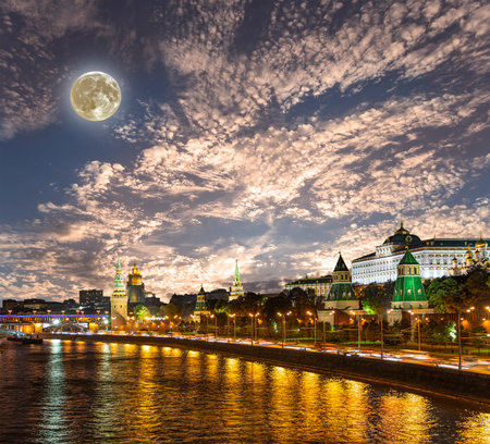Night view of the Moskva River and Kremlin, Russia, Moscow (most popular view). Against the background of a beautiful sky with clouds, with the moonの写真素材