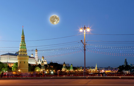 Night view of the Moscow Kremlin, Russia (the most popular view). Against the background of a beautiful sky with the moonの写真素材