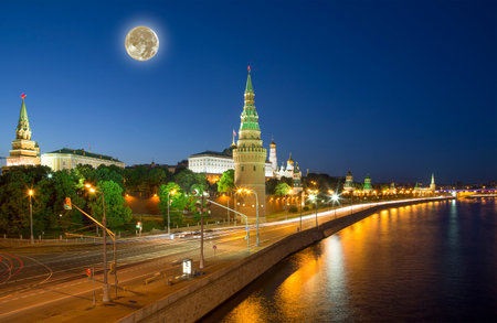 Night view of the Moskva River and Kremlin, Russia, Moscow (most popular view). Against the background of a beautiful sky with clouds, with the moonの写真素材