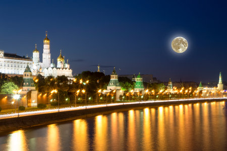 Night view of the Moskva River and Kremlin, Russia, Moscow (most popular view). Against the background of a beautiful sky with clouds, with the moonの写真素材