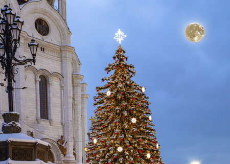 Christmas (New Year holidays) decoration in Moscow (at night with the super moon), Russia--near the Christ the Savior Cathedralの写真素材