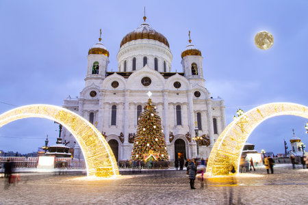 Christmas (New Year holidays) decoration in Moscow (at night with the super moon), Russia--near the Christ the Savior Cathedralの写真素材