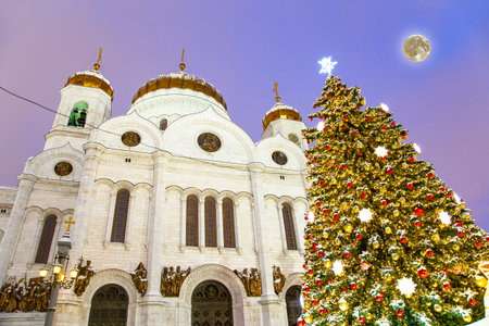 Christmas (New Year holidays) decoration in Moscow (at night with the super moon), Russia--near the Christ the Savior Cathedralの写真素材