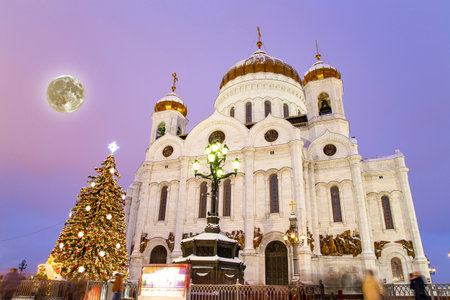 Christmas (New Year holidays) decoration in Moscow (at night with the super moon), Russia--near the Christ the Savior Cathedralの写真素材