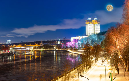Christmas (New Year holidays) decoration in Moscow (at night, with the super moon), Russia-- Andreevskaya (Andreevsky) embankmentの写真素材