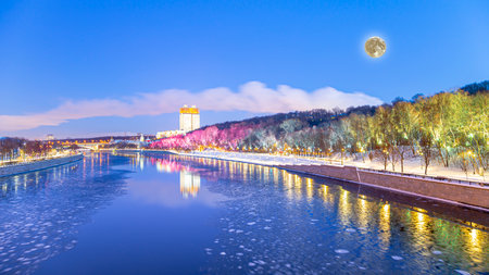 Christmas (New Year holidays) decoration in Moscow (at night, with the super moon), Russia-- Andreevskaya (Andreevsky) embankmentの写真素材
