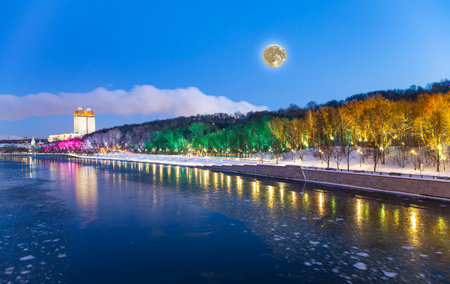 Christmas (New Year holidays) decoration in Moscow (at night, with the super moon), Russia-- Andreevskaya (Andreevsky) embankmentの写真素材