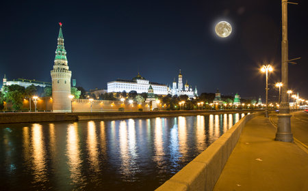 Night view of the Moskva River and Kremlin, Russia, Moscow (most popular view). Against the background of a beautiful sky with clouds, with the moonの写真素材