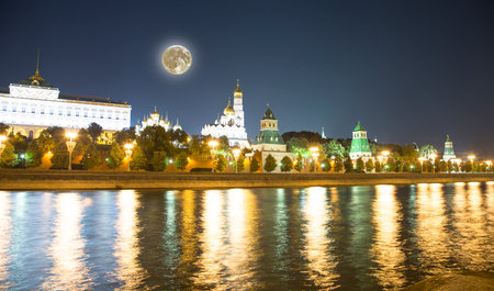 Night view of the Moskva River and Kremlin, Russia, Moscow (most popular view). Against the background of a beautiful sky with clouds, with the moonの写真素材