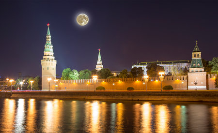 Night view of the Moskva River and Kremlin, Russia, Moscow (most popular view). Against the background of a beautiful sky with clouds, with the moonの写真素材