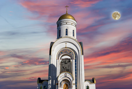 Church of St. George on Poklonnaya hill with the super moon, Moscow, Russia.の写真素材