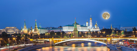 Night view of the Moskva River and Kremlin, Russia, Moscow (most popular view). Against the background of a beautiful sky with clouds, with the moonの写真素材