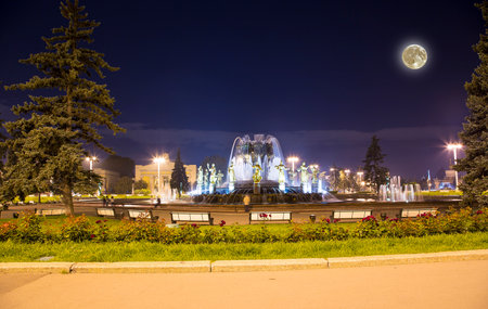 Fountain Friendship of Nations at night, with the super moon (1951-54, architects K. Topuridze and G. Konstantinovsky) - VDNKH (All-Russia Exhibition Centre), Moscow, Russiaの写真素材