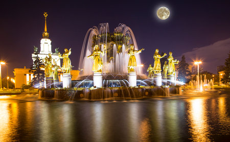 Fountain Friendship of Nations at night, with the super moon (1951-54, architects K. Topuridze and G. Konstantinovsky) - VDNKH (All-Russia Exhibition Centre), Moscow, Russiaの写真素材