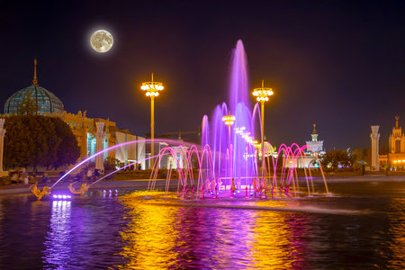 Fountain Friendship of Nations at night, with the super moon (1951-54, architects K. Topuridze and G. Konstantinovsky) - VDNKH (All-Russia Exhibition Centre), Moscow, Russiaの写真素材