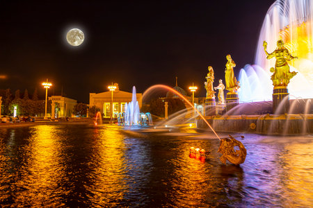 Fountain Friendship of Nations at night, with the super moon (1951-54, architects K. Topuridze and G. Konstantinovsky) - VDNKH (All-Russia Exhibition Centre), Moscow, Russiaの写真素材