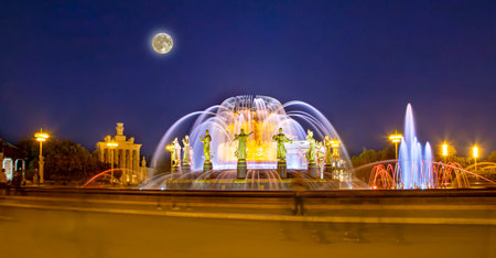 Fountain Friendship of Nations at night, with the super moon (1951-54, architects K. Topuridze and G. Konstantinovsky) - VDNKH (All-Russia Exhibition Centre), Moscow, Russiaの写真素材