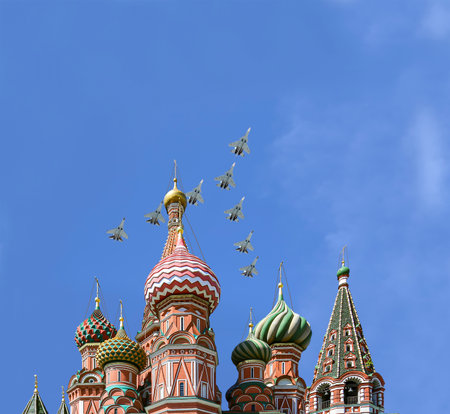 Temple of Basil the Blessed and Russian military aircraft in the sky, Air parade in honor of Victory Day celebration (WWII), Red Square, Moscow, Russiaの写真素材