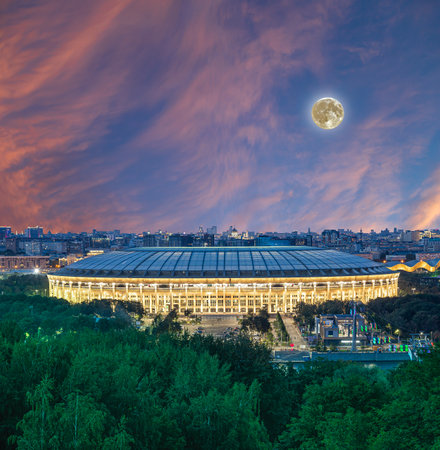 View of Luzhniki stadium from Sparrow Hills or Vorobyovy Gory observation (viewing) platform (at night with the super moon). Moscow, Russiaの写真素材