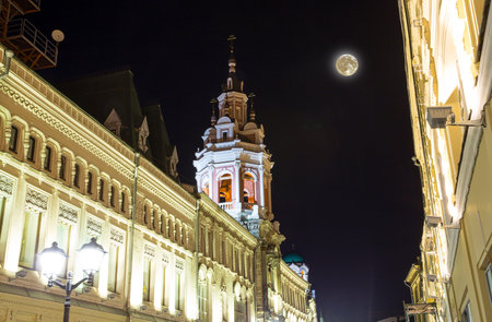 Historic buildings on Nikolskaya Street near the Moscow Kremlin, at night with the super moon, Russiaの写真素材