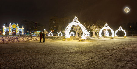 Christmas (New Year holidays) decoration in Moscow (at night, with the super moon), Russia-- near...
