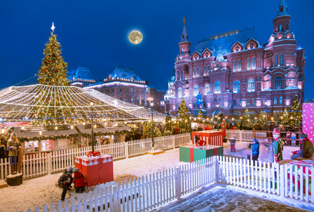 Christmas (New Year holidays) decoration in Moscow (at night with the super moon), Russia-- Manege Square near the Kremlin. English translation from Russian: Historical Museumの写真素材