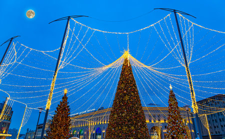 Christmas (New Year holidays) decoration in Moscow (at night with the super moon), Russia. Lubyanskaya (Lubyanka) Square. Central Children's Store--inscription in Englishの写真素材