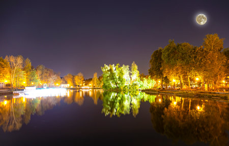 Gorky Park-Central Park of Culture and Rest-- pond, one of the main city sights and landmark in Moscow, Russia (at night, with the super moon)の写真素材